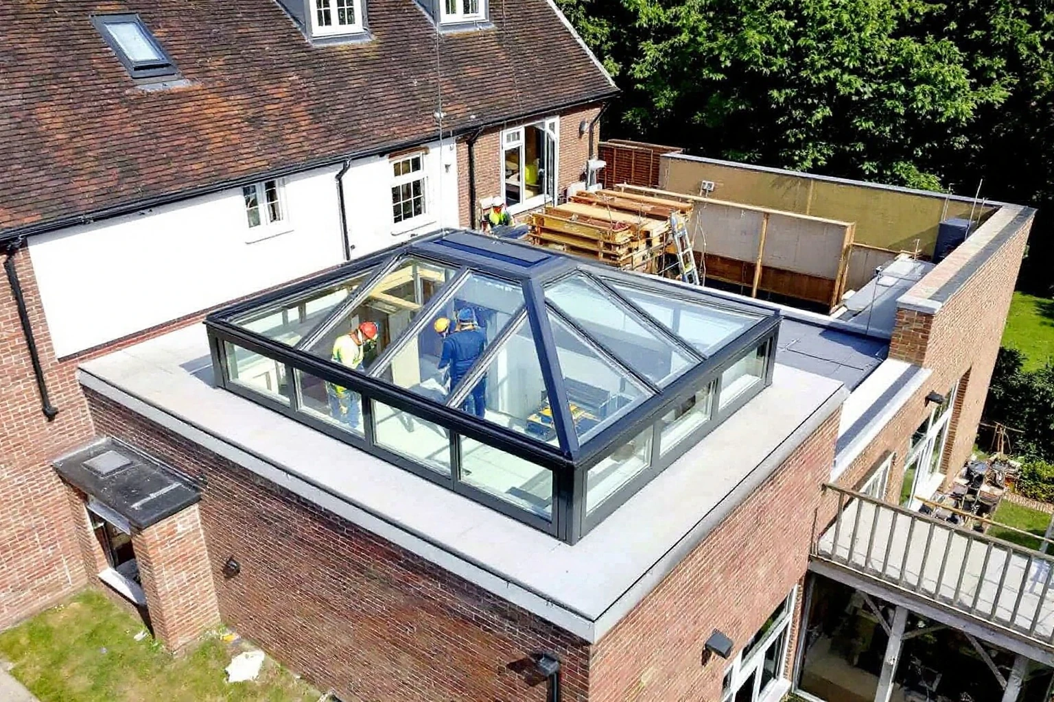 Flat roof structure and Korniche lantern installation — Crowthorne